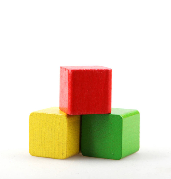 Studio Shot Of Colorful Toy Blocks Against White Background - Photo, Image
