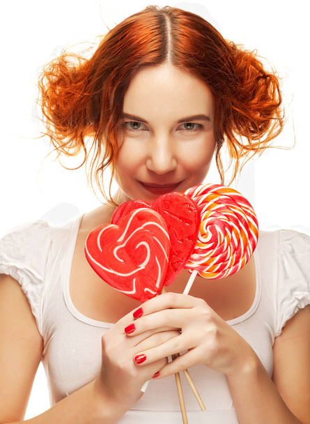 pretty woman with lollipop. - Foto, Bild