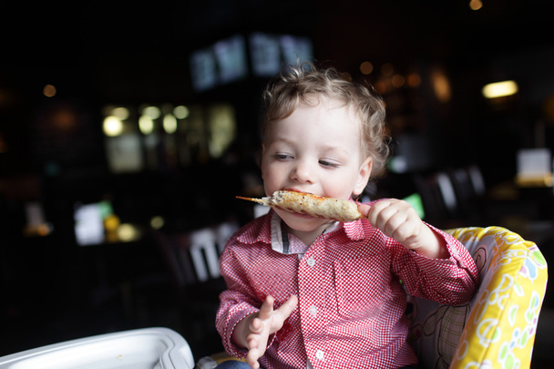 Boy eating kebab - Foto, Imagen