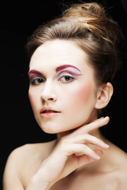 young female face with bright fashion multicolored make-up - Photo, image