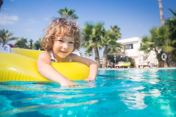 Child in swimming pool - Фото, изображение