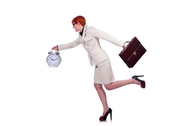 Mujer de negocios con reloj en blanco
 - Foto, imagen