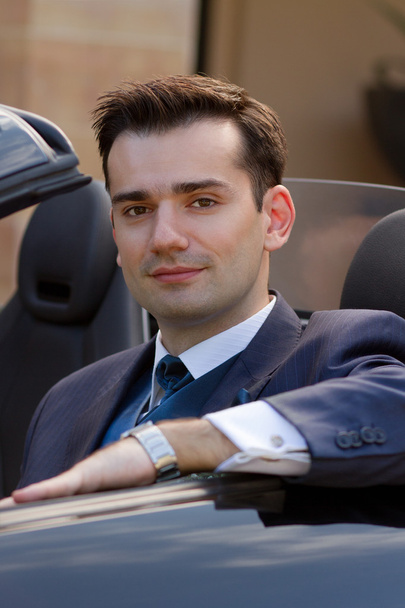Handsome businessman in cabrio - Valokuva, kuva