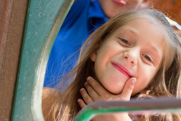 Funny little girl on the playground - Valokuva, kuva