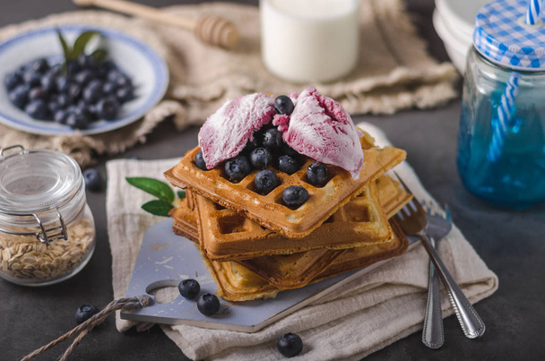 Crispy homemade waffles with berries, topped maple syrup - Fotoğraf, Görsel