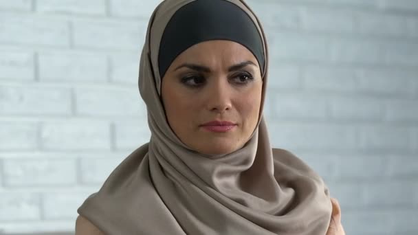 Melancholic arab female in hijab feeling upset after quarrel, stress and sadness - Felvétel, videó