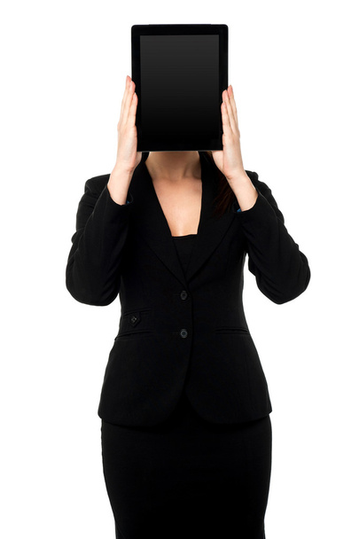 Woman hiding her face with tablet pc - Φωτογραφία, εικόνα