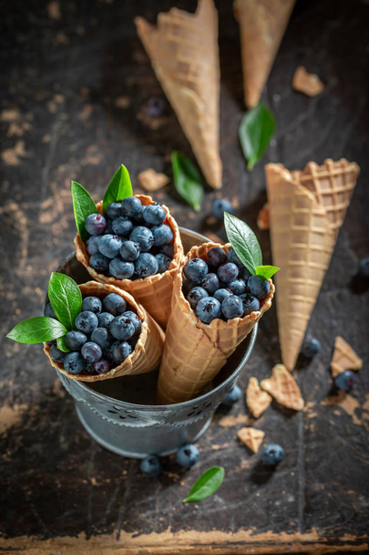 Yummy blueberries in waffels as concept of ice cream - Foto, imagen