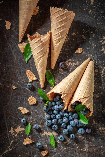 Fresh blueberries in waffels as concept of ice cream - Fotoğraf, Görsel
