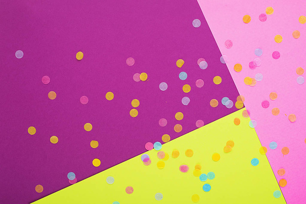 Abstract geometric festive background with sequins. Purple, pink and yellow trend colors 2019, - 写真・画像