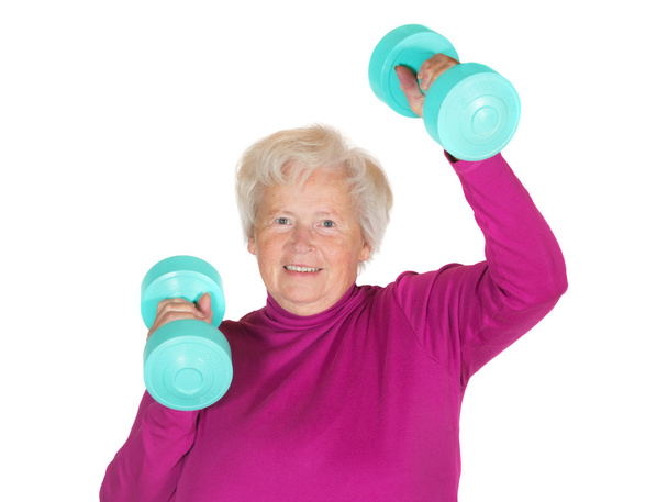 Senior lady working out with weights - Photo, Image