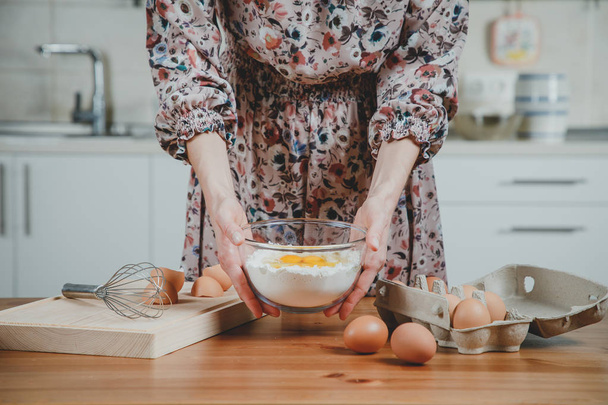 cropped image of woman making dough in kitchen - Fotografie, Obrázek