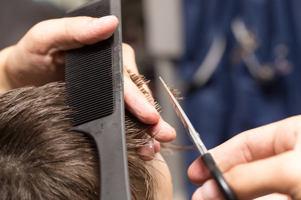 mens hair cutting scissors in a beauty salon - Φωτογραφία, εικόνα