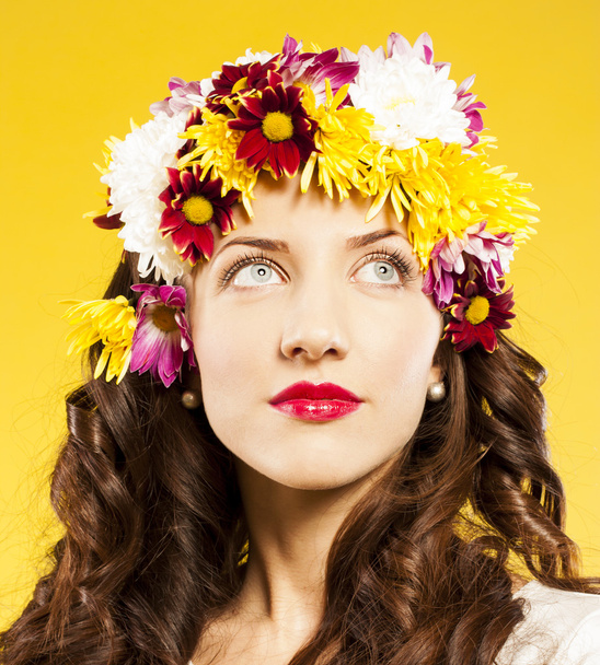 Spring woman with elegant hairstyle. studio yellow - Foto, imagen