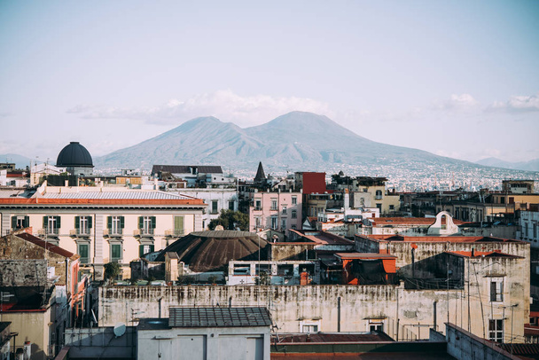 NAPLES, ITALY - 18 DECEMBER, 2017: View of Mount Vesuvius seen from Castel Sant 'Elmo in Naples, Campania, Italy. - 写真・画像