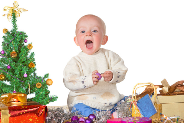 Lindo bebé disfrutando de Navidad
 - Foto, Imagen