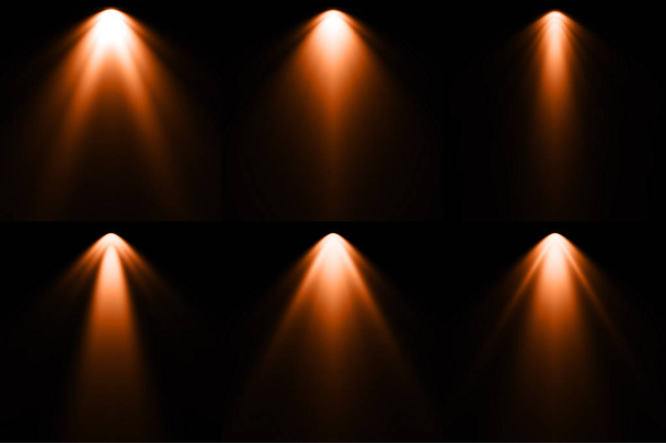 オレンジ色の黒の背景にライト スポット ライトの背景 - 写真・画像