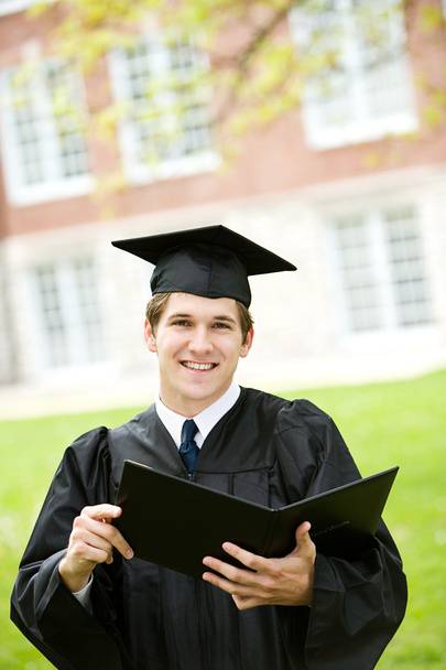 Graduation: Smart Student Holds Diploma - Fotografie, Obrázek