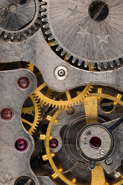 Details of the mechanism of a mechanical clock. Macro shooting - Photo, Image
