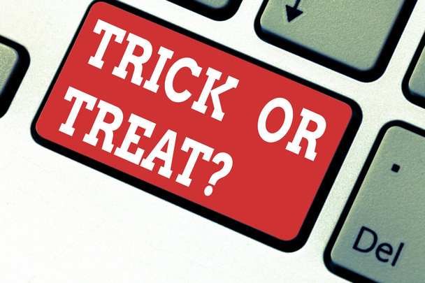Handwriting text writing Trick Or Treat. Concept meaning Halloween tradition consisting in asking for sweets Keyboard key Intention to create computer message pressing keypad idea. - Photo, Image