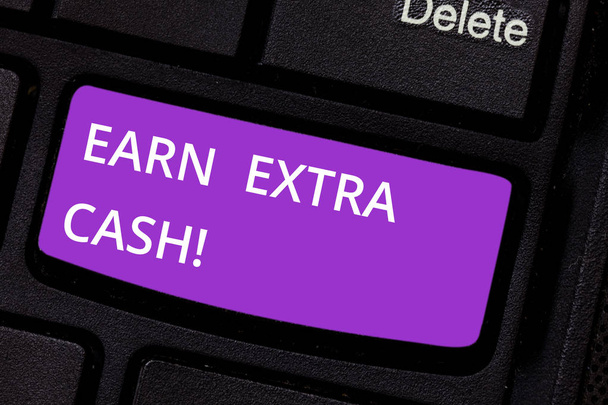 Text sign showing Earn Extra Cash. Conceptual photo Make additional money more incomes bonus revenue benefits Keyboard key Intention to create computer message pressing keypad idea. - Photo, Image