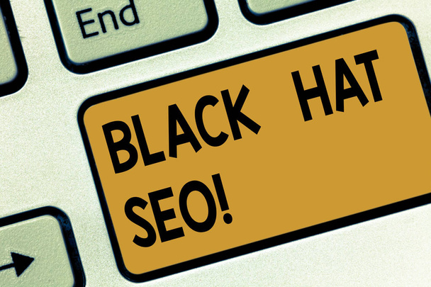 Text sign showing Black Hat Seo. Conceptual photo Search Engine Optimization using techniques to cheat browsers Keyboard key Intention to create computer message pressing keypad idea. - Photo, Image