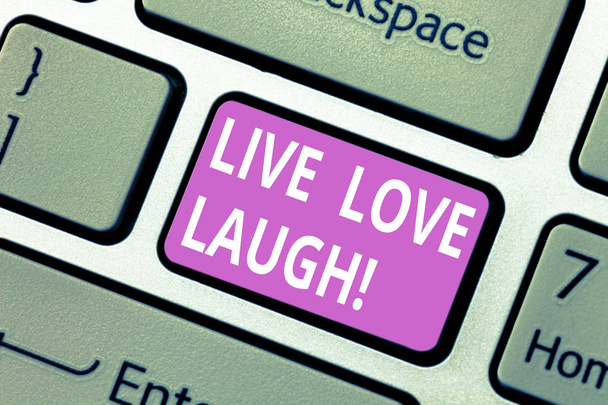 Text sign showing Live Love Laugh. Conceptual photo Be inspired positive enjoy your days laughing good humor Keyboard key Intention to create computer message pressing keypad idea. - Photo, Image
