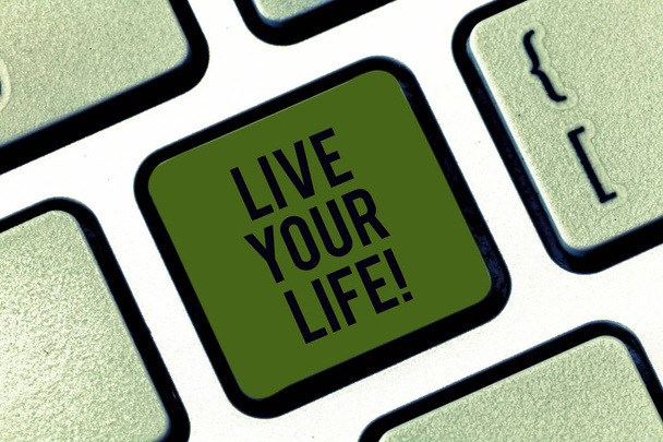 Word writing text Live Your Life. Business concept for Motivation inspiration to follow your dreams accomplish goals Keyboard key Intention to create computer message pressing keypad idea. - Fotografie, Obrázek