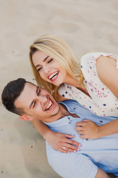 portrait of beautiful couple posing hugging and laughing - Foto, Imagen