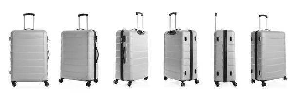 Set of stylish light suitcase for travelling on white background - Foto, imagen