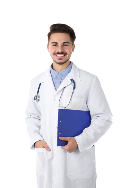 Young medical student with clipboard on white background - Valokuva, kuva