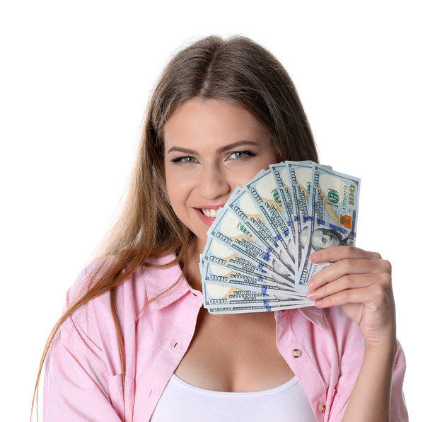 Happy young woman with money on white background - 写真・画像