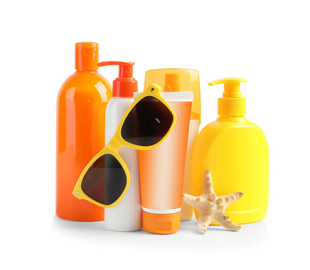 Composition with sun protection products on white background. Body care - Foto, Imagen