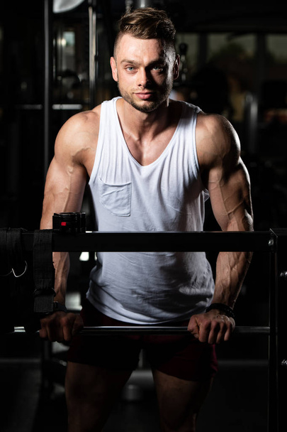 Handsome Good Looking And Attractive Young Man With Muscular Body Relaxing In Gym - Foto, afbeelding