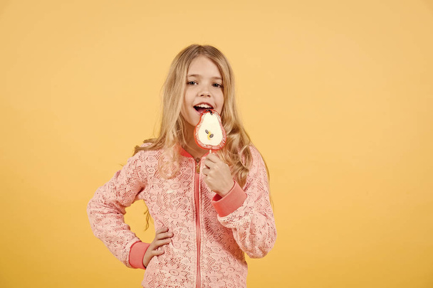 Beautiful cute little girl eat lollipop - Fotografie, Obrázek