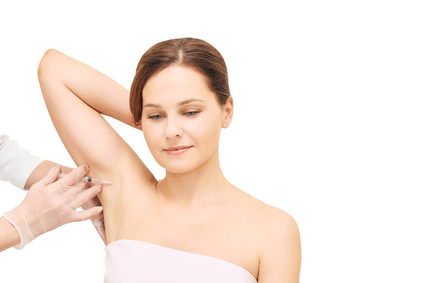 Armpit anti hyperhidrosis treatment. Cosmetic injecting procedure. Clinic cosmetology sweat therapy. Beuty young woman. Girl skin care. - Fotó, kép
