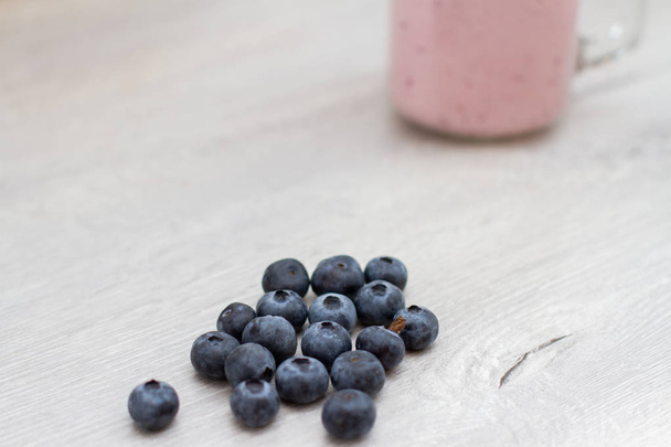 blueberry on white wooden background - 写真・画像