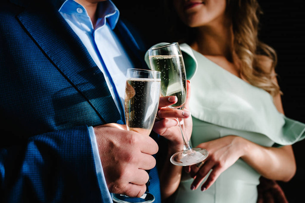 bride and groom holding glass of champagne - Photo, Image