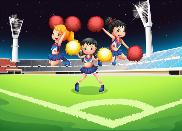 Tres animadoras actuando en el campo de fútbol
 - Vector, Imagen