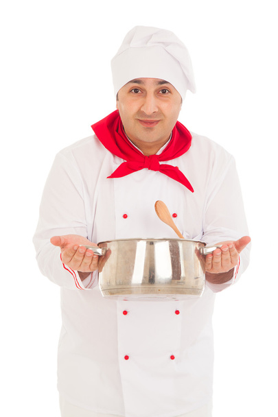 smiling chef holding saucepan weraing red and white uniform - Фото, зображення
