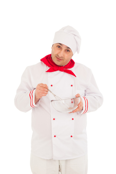 smiling chef holding whisk and transparent bowl weraing red and - Фото, зображення