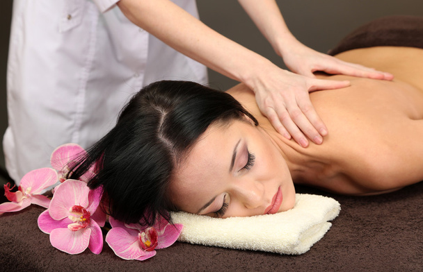 Woman in spa salon getting massage - Foto, afbeelding