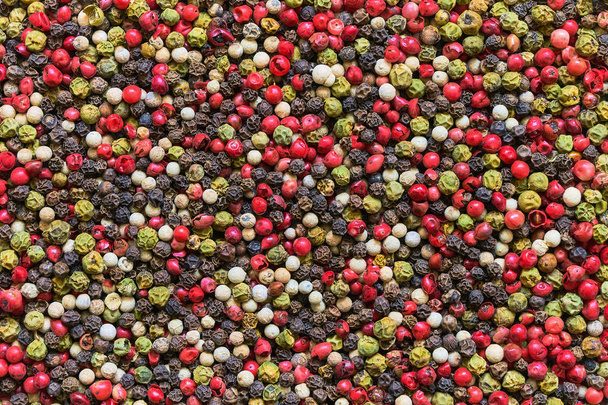 Peppercorns. Colorida mezcla de pimienta. Fondo de granos de pimienta, textura. Vista superior
 - Foto, Imagen