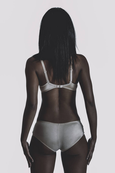 Rear view of slim black woman - Valokuva, kuva