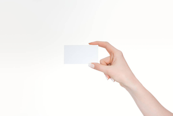 cropped view of woman holding empty card isolated on white - Foto, Imagem
