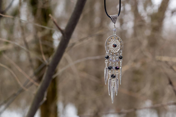Dream catcher with feathers threads and beads rope hanging. Dreamcatcher handmade - Photo, Image