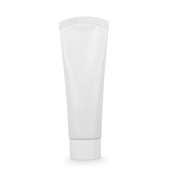 A tube with cream or toothpaste on a white background - Valokuva, kuva