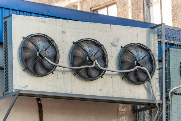 Industrial air conditioning on a high-rise building, the concept of warmth, coolness and comfort - Photo, Image