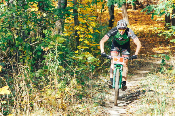 October 14, 2018 - Minsk, Belarus: 2018 Olympic Cross Country Cup XCO in Medvezhino, man riding mtb bicycle during race - Photo, Image