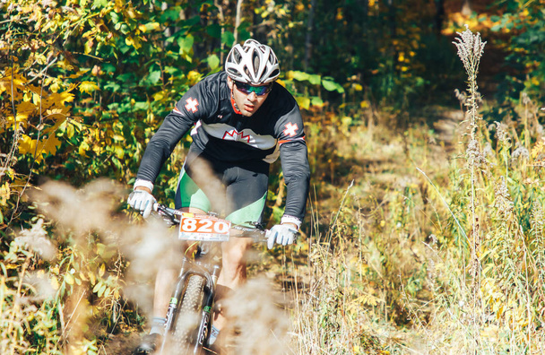 October 14, 2018 - Minsk, Belarus: 2018 Olympic Cross Country Cup XCO in Medvezhino, man riding mtb bicycle during race - Foto, immagini
